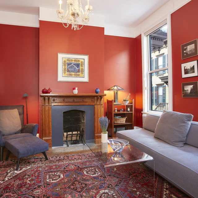 Step back in time in this charming row house on Washington Height's