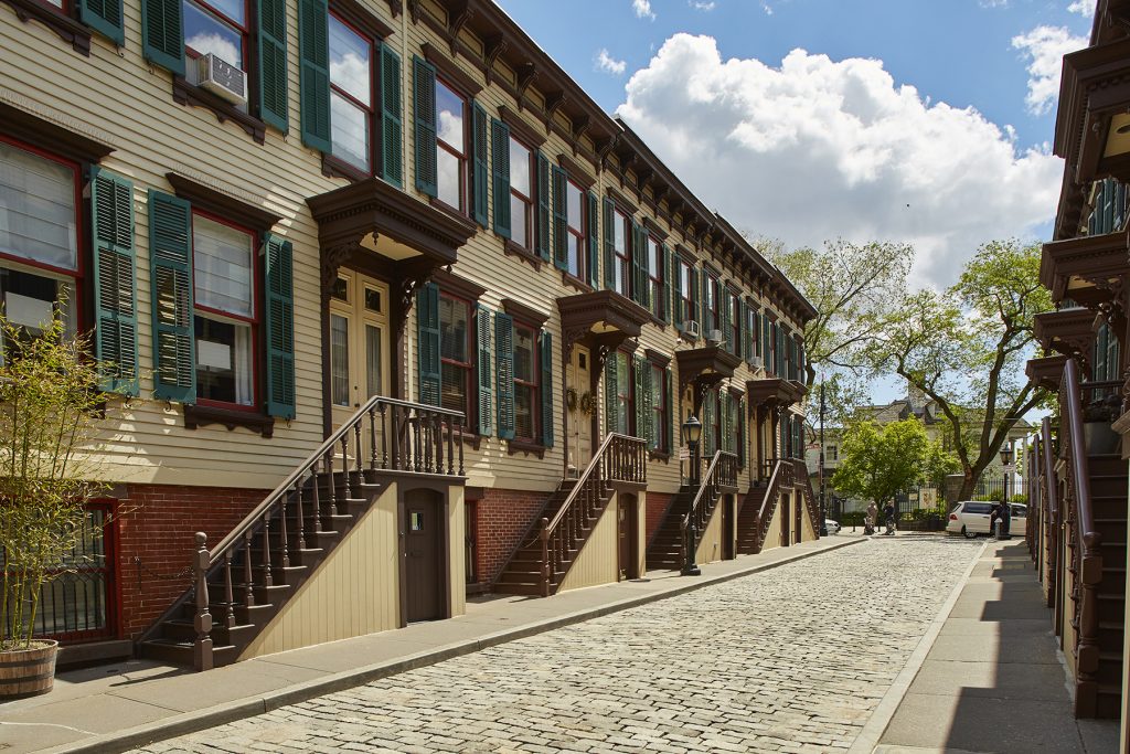 Step back in time in this charming row house on Washington Height's