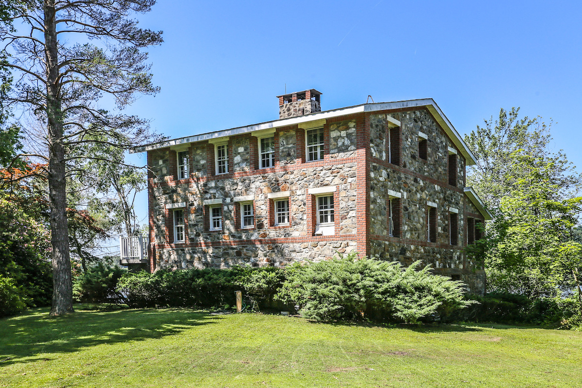 You can buy this house on a private island upstate for 850K, but you