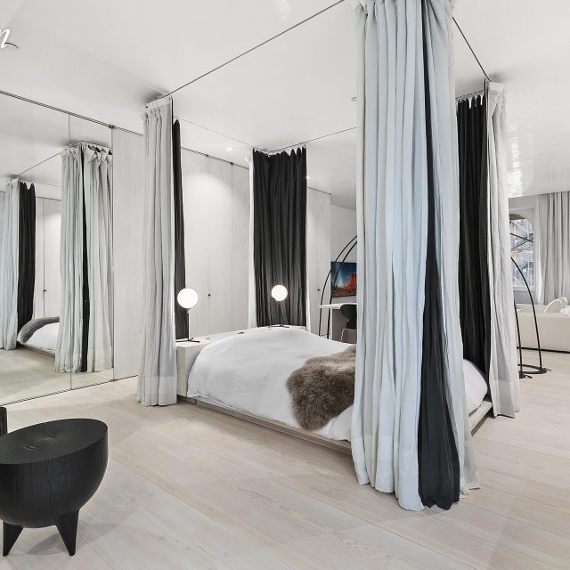 There’s a freestanding bed and hidden closets at this $1.5M Flatiron loft