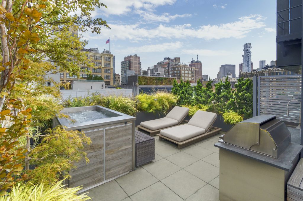 Private Penthouse Apartments With Hot Tub And Outdoor Living And Kitchen