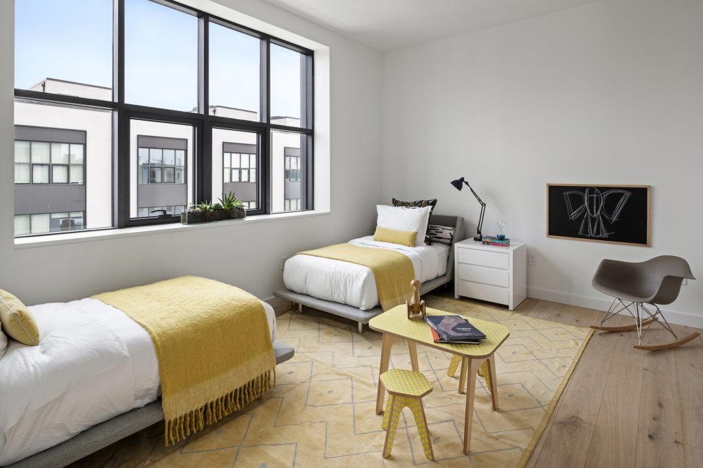 This 3.5M newconstruction Red Hook townhouse has a pool, a driveway