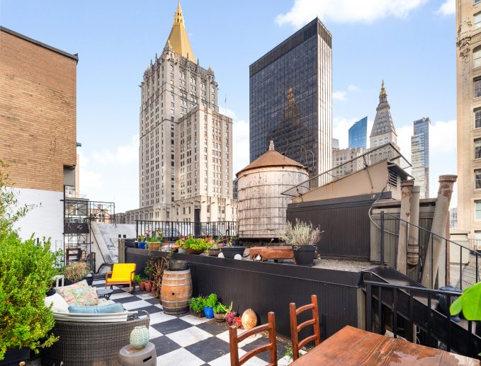 Paris garret and rooftop cabin meet in this unique Nomad penthouse ... - Gourmet Penthouse Kitchen With Drop-In Range And Quartz Cou